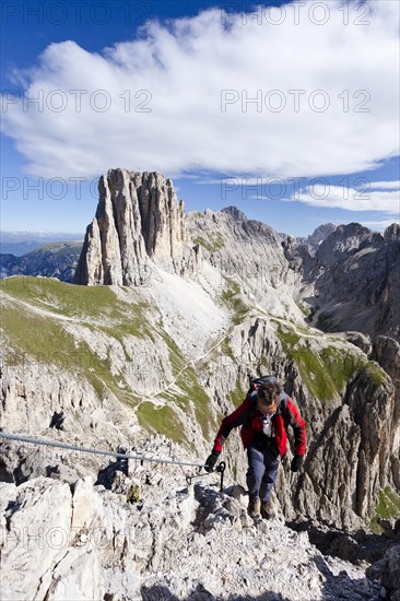 Climbers during the ascent to the Croda Rossa in the Rose Garden Group over the Croda Rossa via ferrata