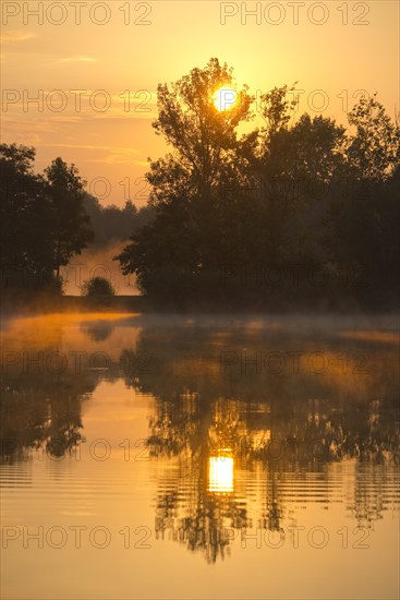 Sunrise over a pond