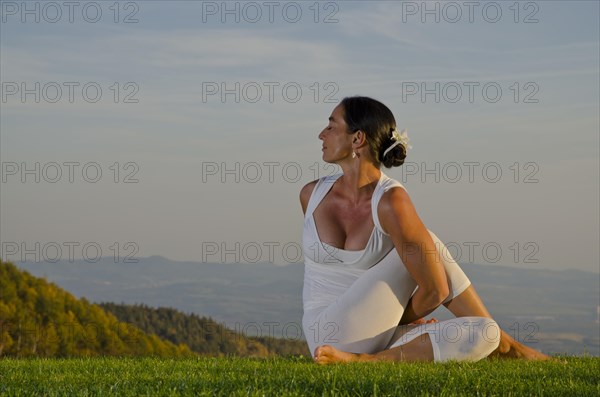 Young woman practising Hatha yoga