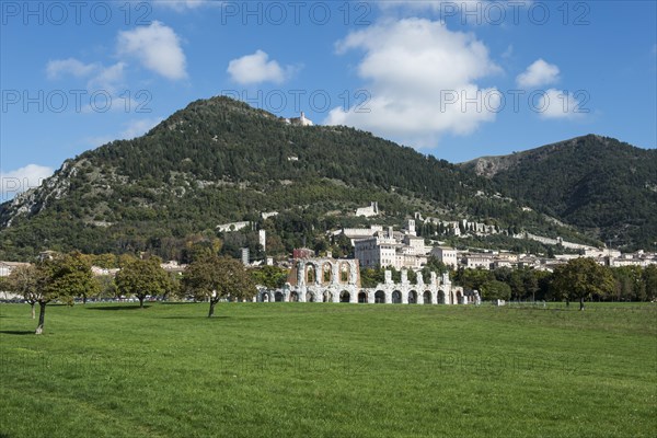 Historic town of Gubbio with Monte Ingino and the Roman theatre