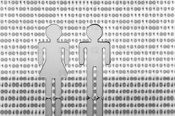 Two figures in front of binary code