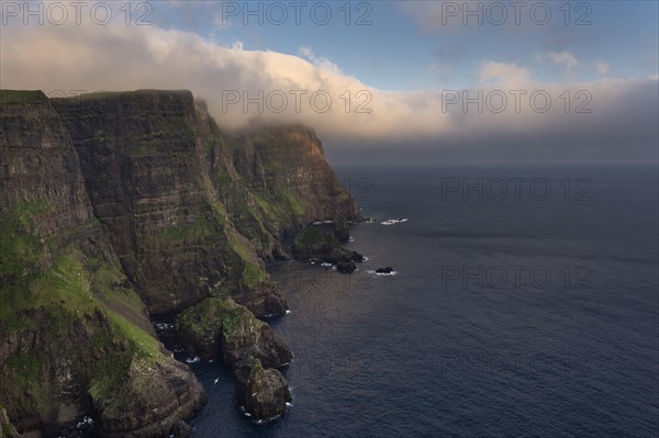 Cliffs and sea in evening light