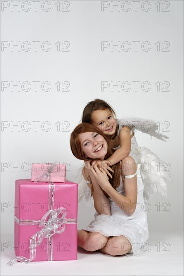 Two girls as angels