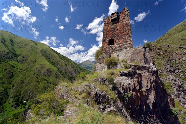 Ruins of a medieval defensive and residential tower on a hilltop