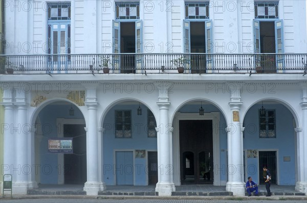 Blue house facade with a front porch