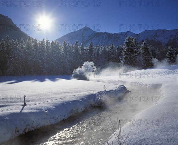 Winter morning at the Aurach river at Fischbachau