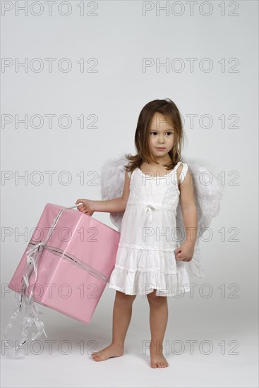 Girl dressed as angel
