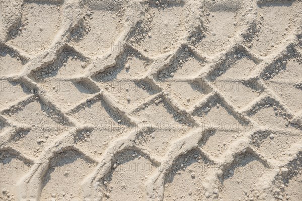 Tire tracks in the sand