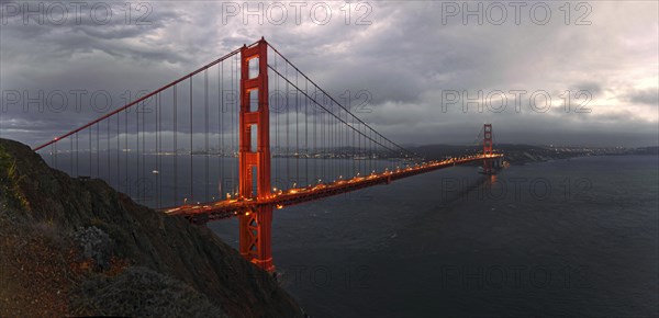 Golden Gate Bridge with storm clouds