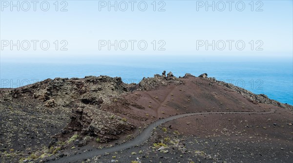 Hiking trail through a lava landscape