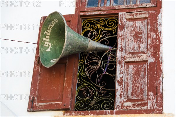 Megaphone in a monastery window