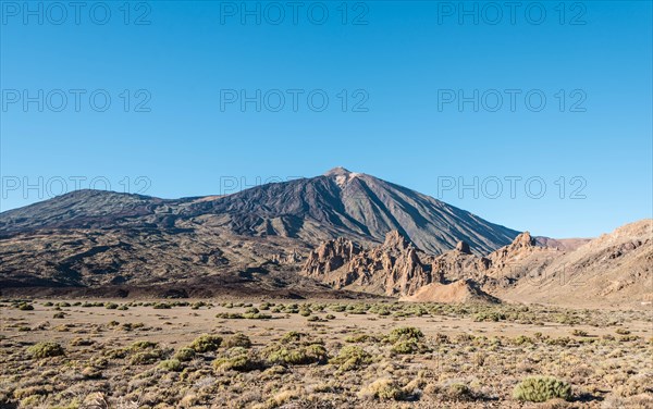 Pico del Teide or Mount Teide with the rock formation Roques de Garcia