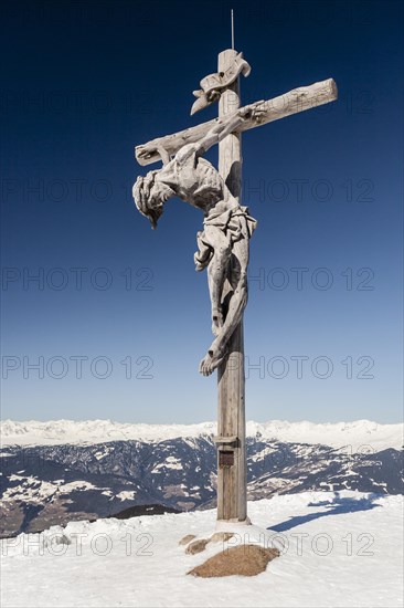 Summit cross on the Rasciesa above Ortisei in Val Gardena