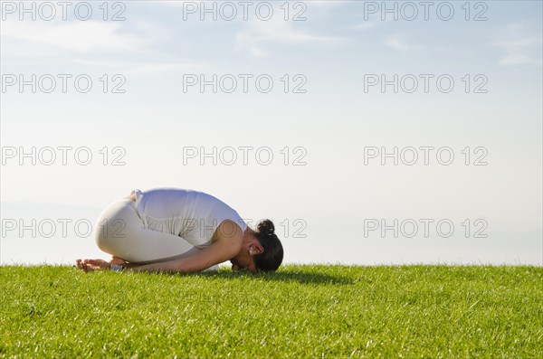 Young woman practising Hatha yoga