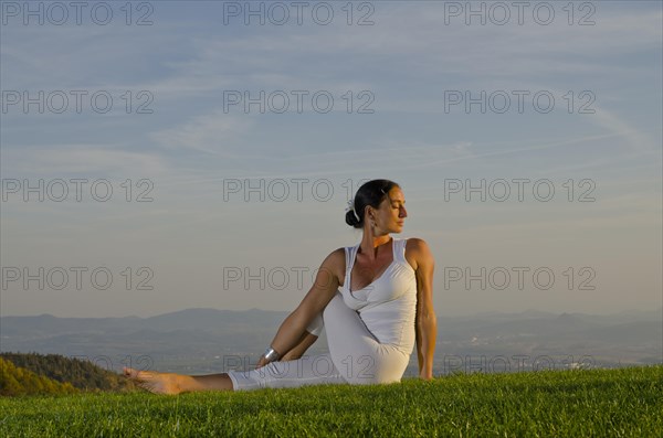 Young woman practising Hatha yoga