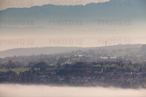 Fog over Uberlingersee lake and Dingelsdorf