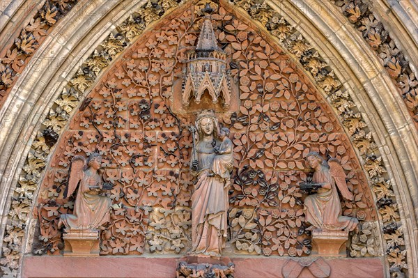 The Virgin Mary with angels in the tympanum of the portal of the Gothic St. Elizabeth's Church