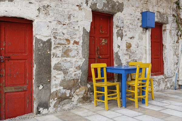 Table and chairs in a lane