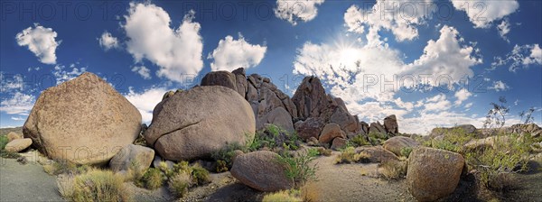 Granite rocks of Split Rocks with cumulus clouds