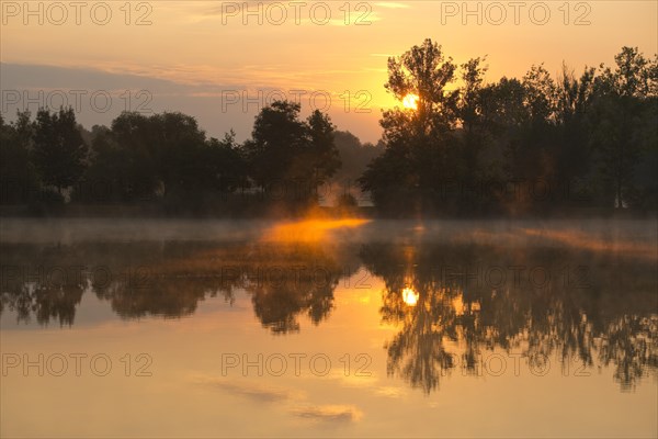 Sunrise over a pond