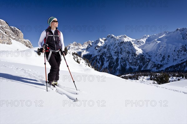 Ski touring in the ascent to Cima Undici in Val S. Nicolo di Fassa