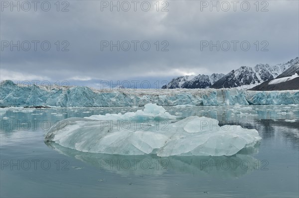 An iceberg and the escarpment of the glacier