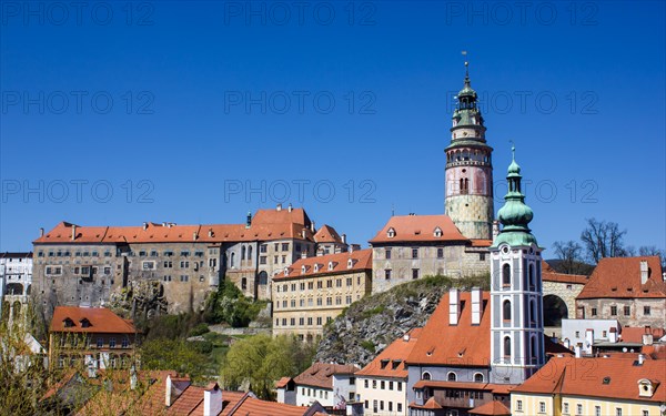 St. Jost Church in front of Cesky Krumlov Castle with the castle tower
