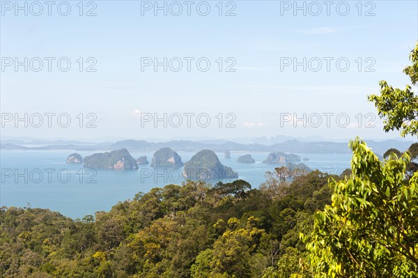 Forested Karst islands rising from the sea