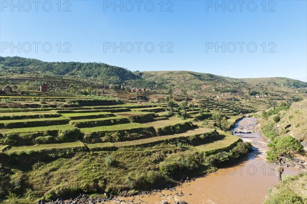 Villages of the Merina people with terraced rice paddies above a river