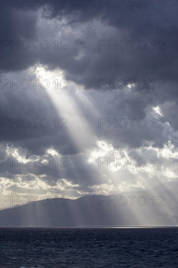 Sun and clouds over the Strait of Messina