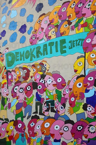Colourful mural with the words 'Demokratie jetzt'