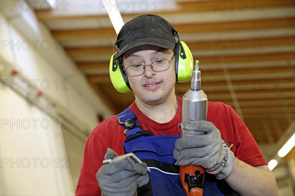 Man with Down syndrome at work