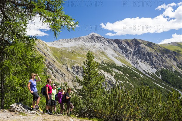 Hikers in the Val Cluozza valley