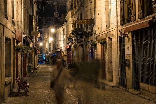 Rue Victor Hugo at night