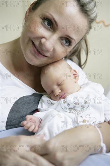 Mother with her newborn baby