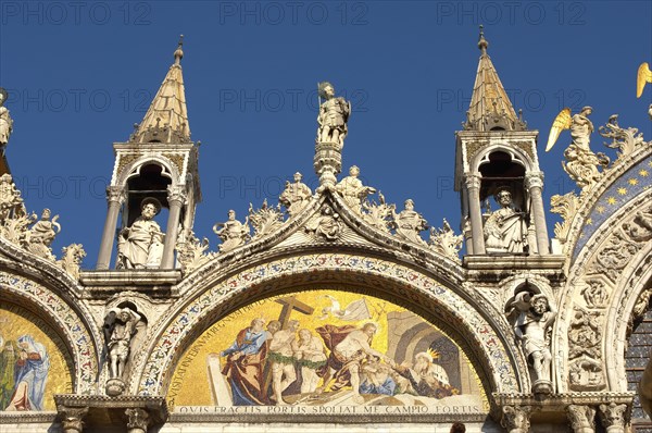 Mosaic and sculptures on the front of St Mark's Basilica