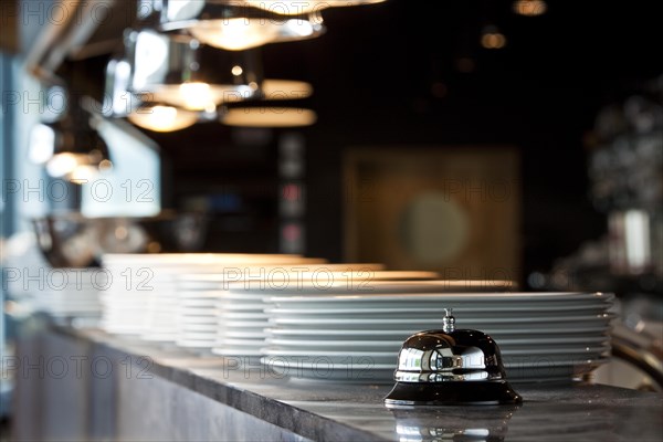 Bell on the food counter of a restaurant