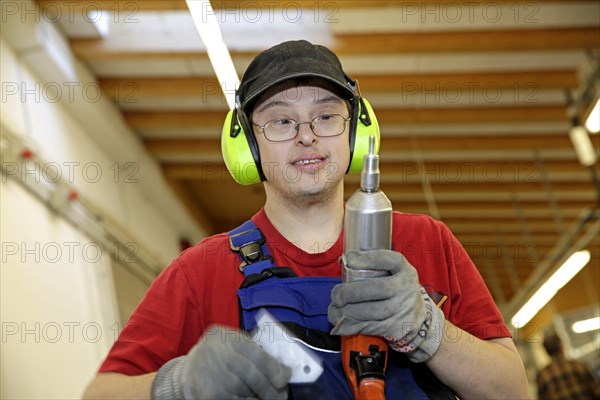 Man with Down syndrome at work