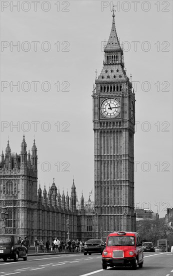 Red taxi on Westminster Bridge with Big Ben or Elizabeth Tower