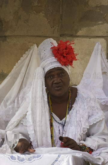 Fortune teller wearing white clothes