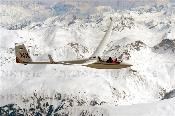 ASH 25 EB glider flying above the French Maritime Alps