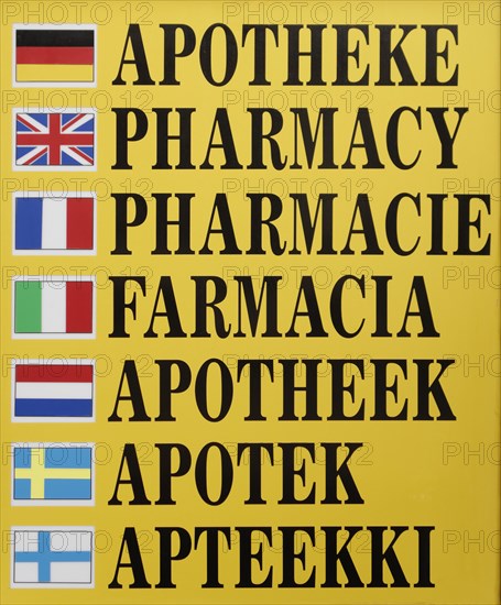 Multilingual sign of a pharmacy
