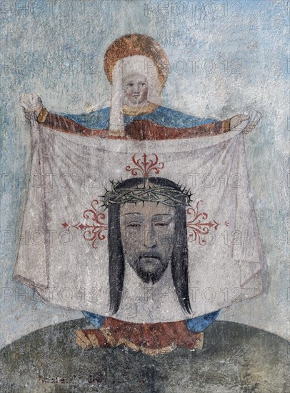 Veronica holds the cloth of Christ