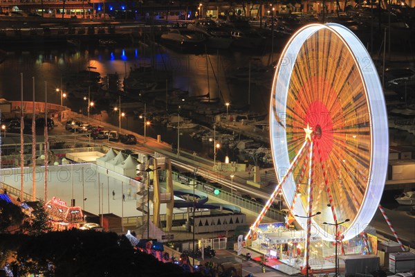 Ferris wheel and ice rink at Port Hercule