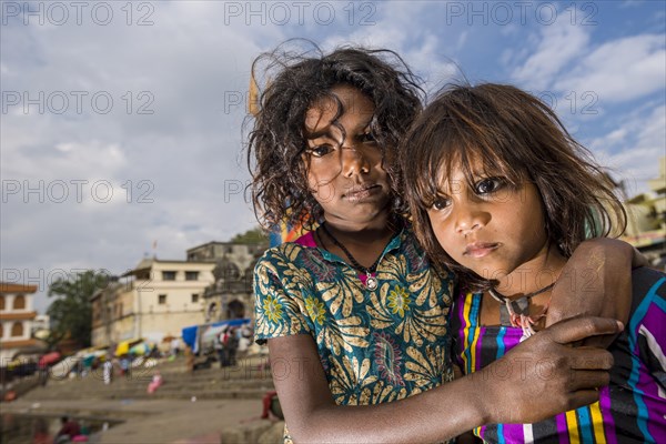 Two girls at the banks of the holy river Godwari