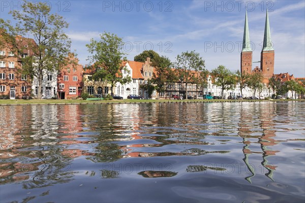 Cathedral reflected in Stadttrave river or Trave River