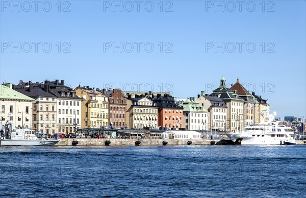 Town houses and commercial buildings along the street of Skeppsbron