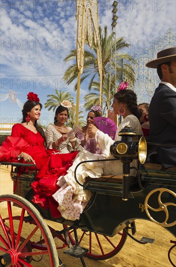 Young ladies wearing gypsy dresses at the Feria del Caballo Horse Fair