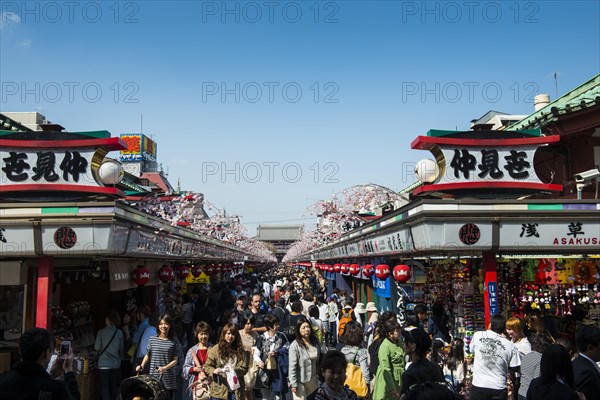 Tourists on their way to Senso-ji temple