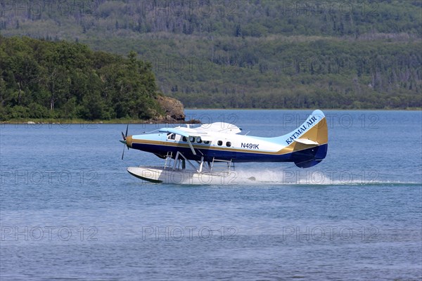 Seaplane taking off on the water